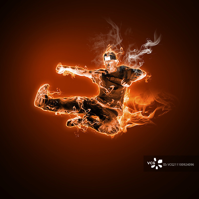 火焰和火焰舞者的黑色背景图片素材