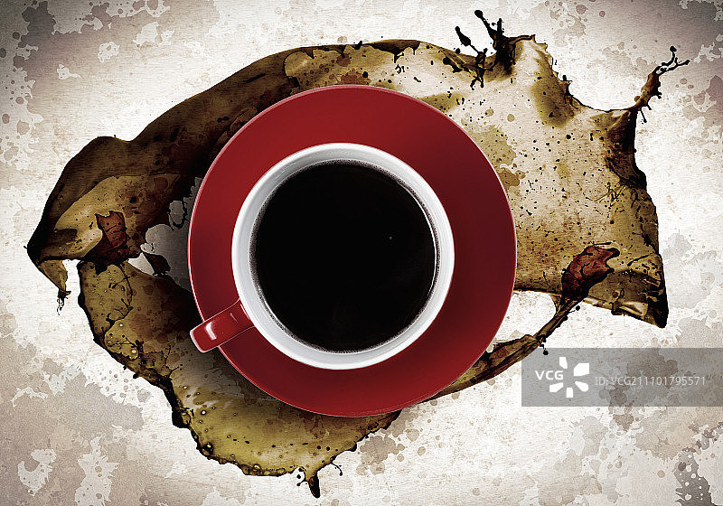 喝咖啡的时间。靠近一杯咖啡和溅来溅去图片素材