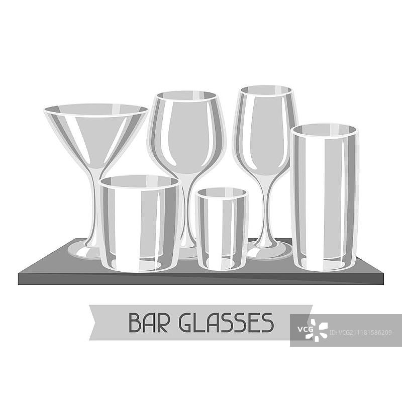 酒吧玻璃杯的种类。架子上有一套酒精玻璃器皿。酒吧玻璃杯的种类。架子上有一套酒精玻璃器皿。图片素材