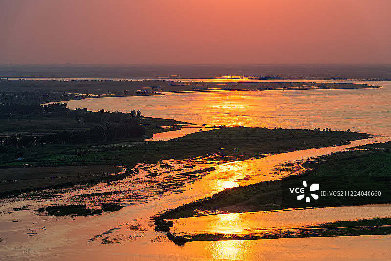 黄河中下游分界线郑州桃花峪景区日落风光图片素材