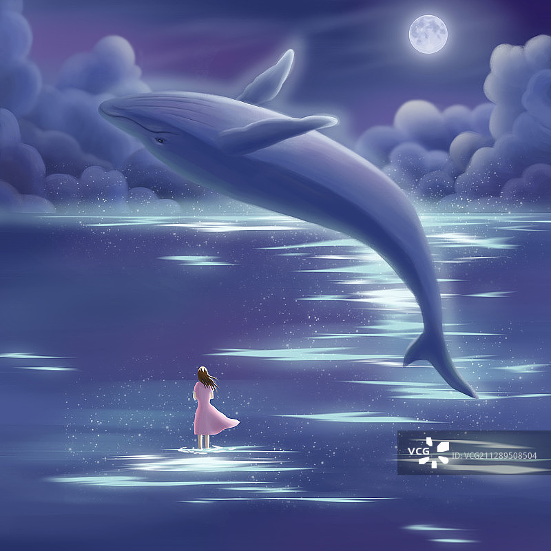 夜空中一只鲸鱼在海面上游走图片素材