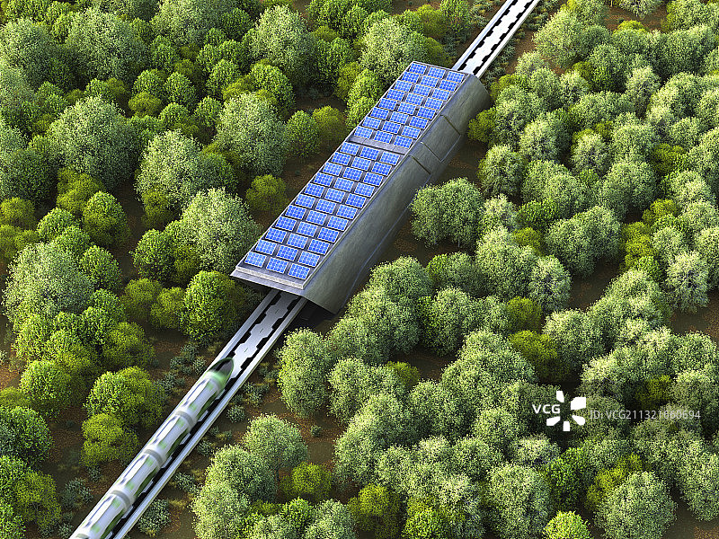现代火车通过覆盖着太阳能板的桥图片素材