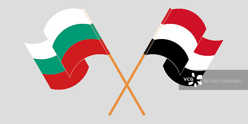 交叉挥舞着保加利亚和也门的旗帜图片素材