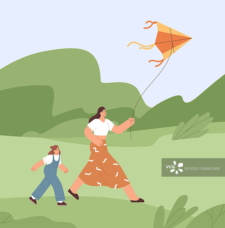 一家人玩风筝，把它放飞到天空图片素材