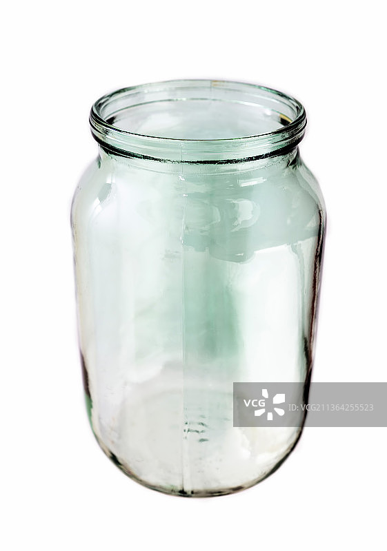 空玻璃罐孤立在白色背景上图片素材