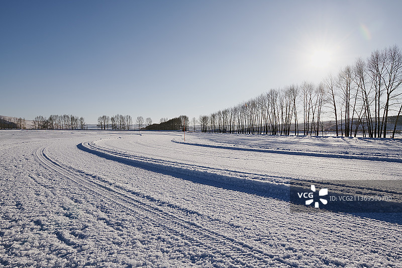 太阳逆光冰雪地面道路图片素材