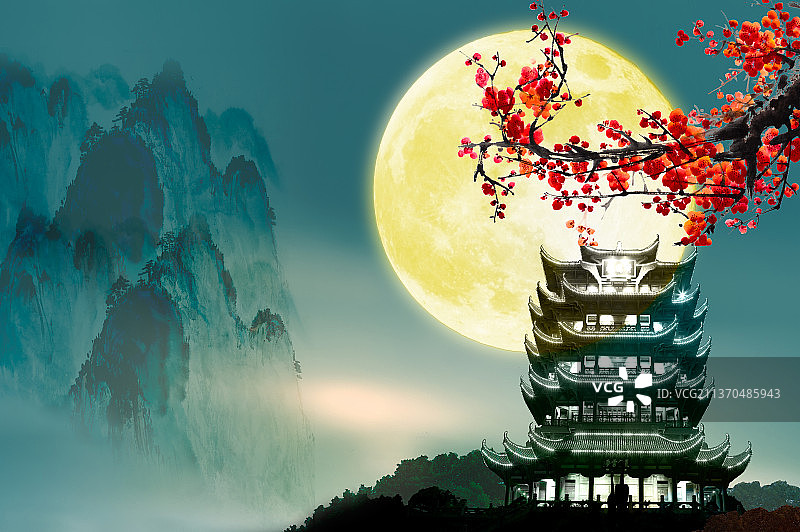 中秋节的夜晚灯火辉煌的黄鹤楼上挂着一轮明月图片素材