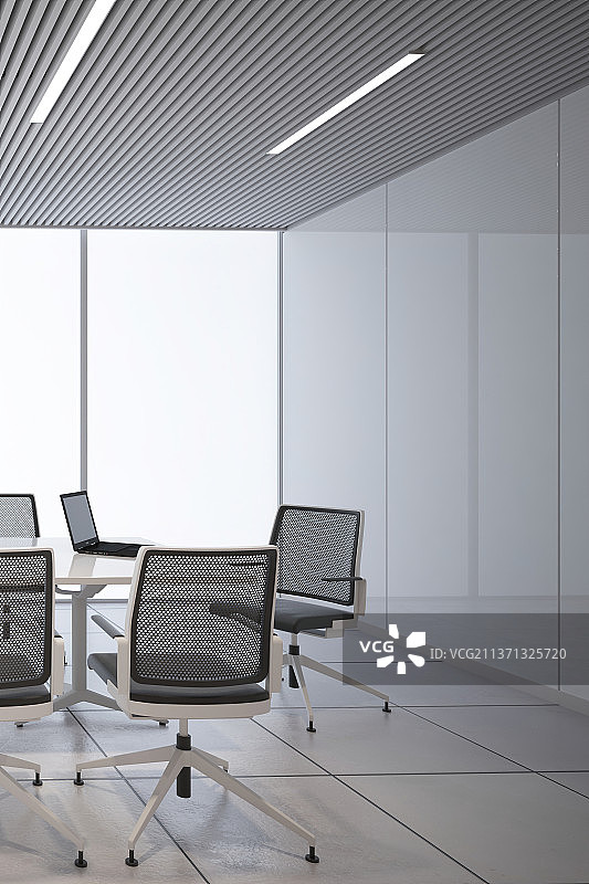 现代风格会议室摆放着会议桌和办公椅子图片素材