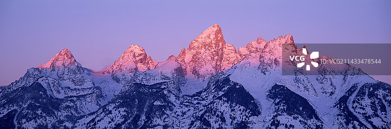 太阳升起在大提顿山脉图片素材