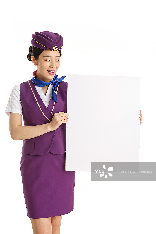 青年女乘务员拿着白板图片素材