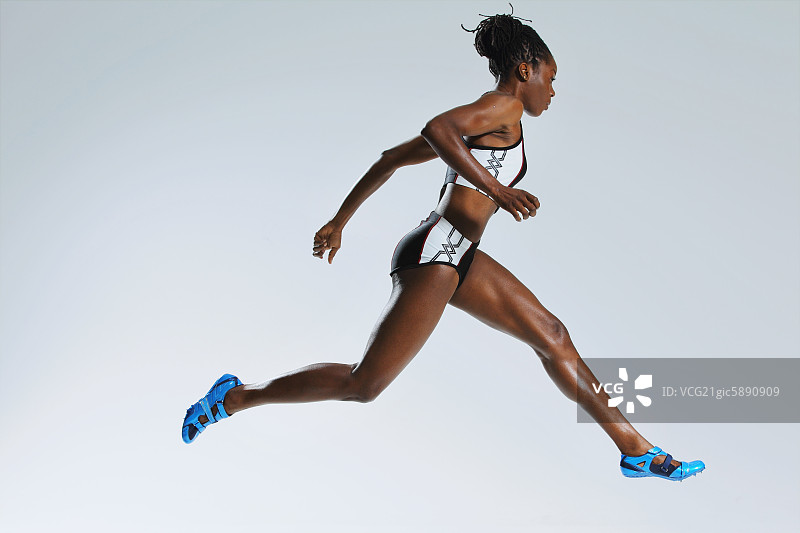 女运动员跑步，摄影图片素材