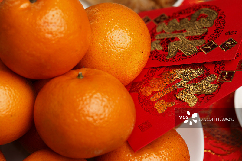 橘子配红包，红包，过年图片素材