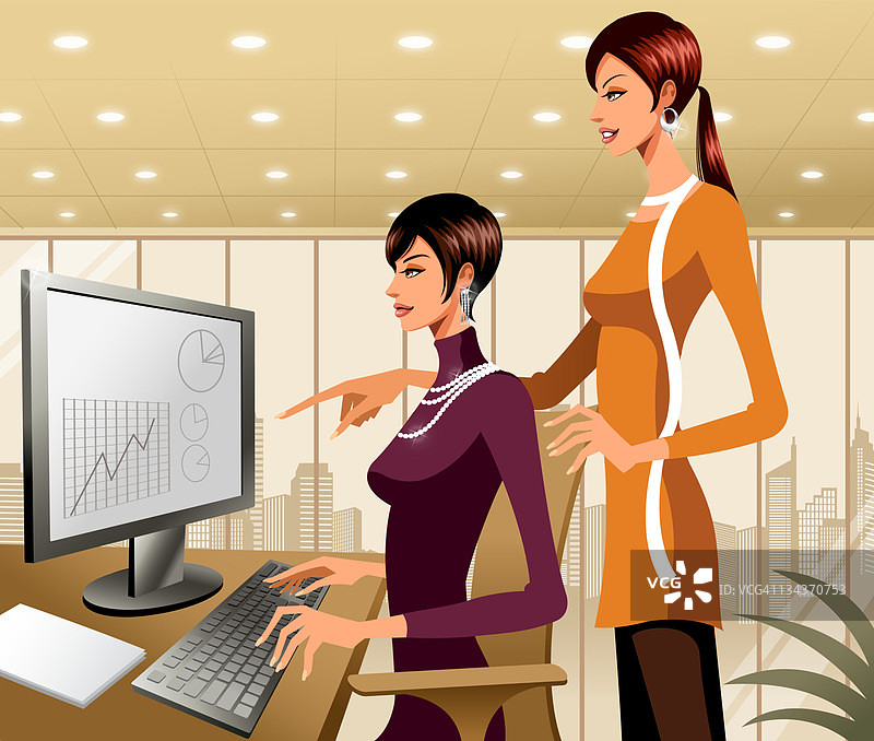 两个女商人在电脑前工作图片素材