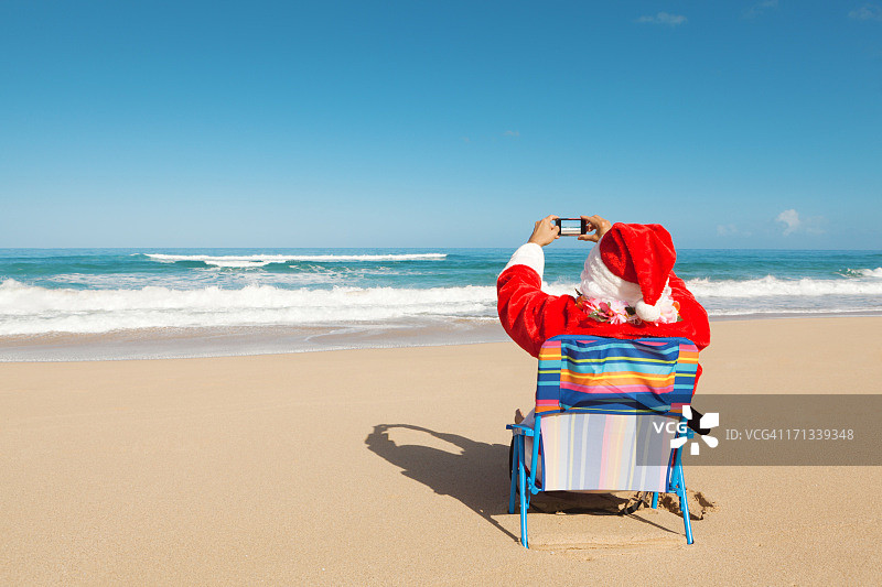 圣诞老人度假在热带天堂海滩赫兹图片素材