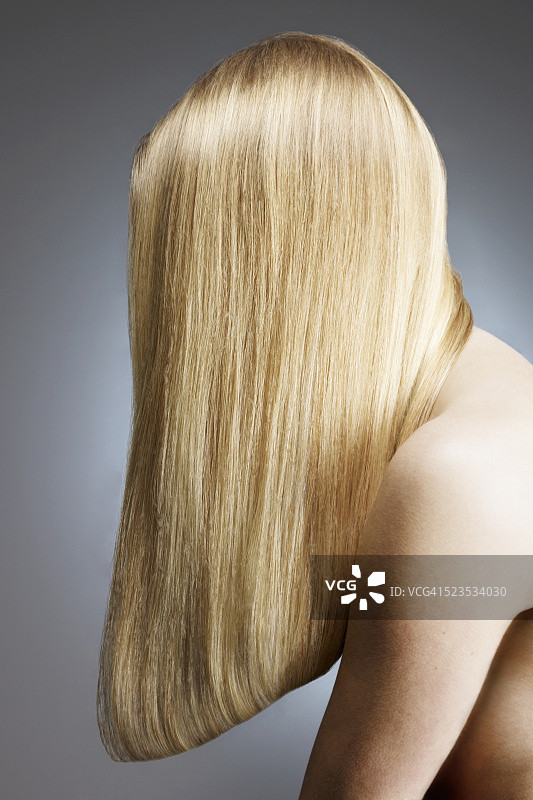 金发女人的侧面视图图片素材