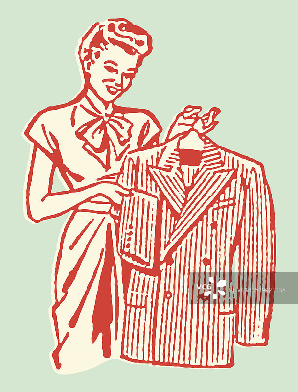 女人把男人的衣服挂在衣架上图片素材