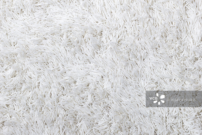一个白色蓬松的地毯纹理的特写图片素材