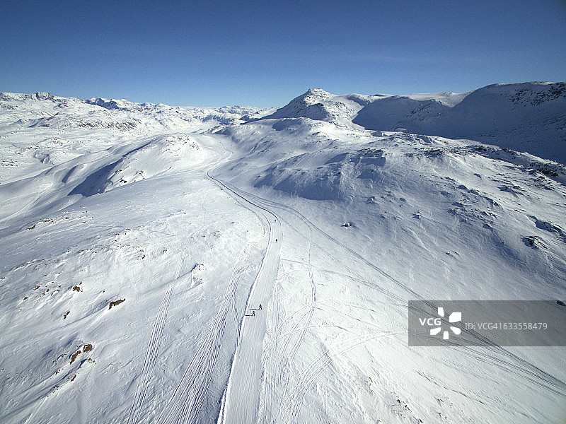 美丽的格陵兰岛上的滑雪者图片素材