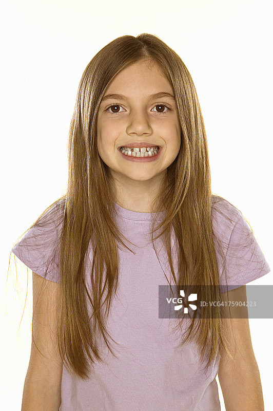 女孩(8-9)微笑，肖像图片素材