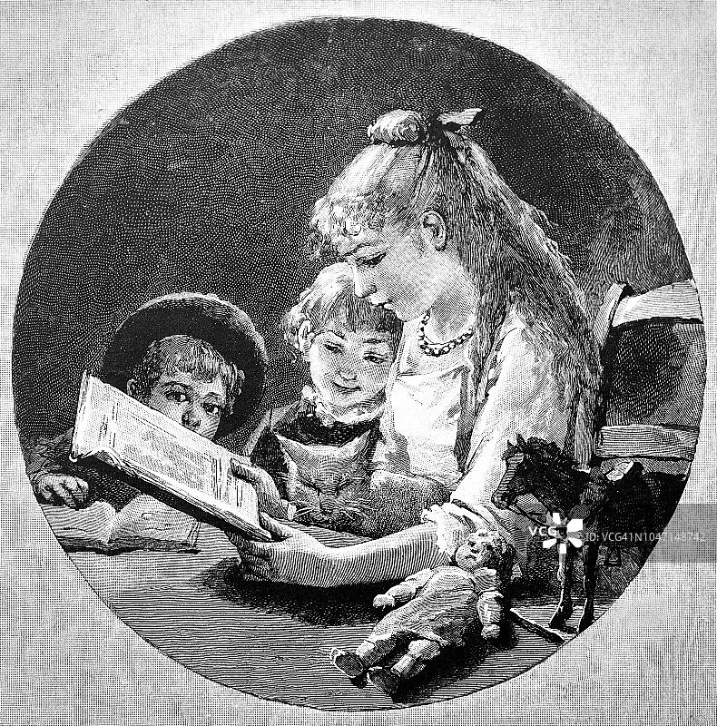 姐姐给她的兄弟姐妹读一本1888年的书里的美丽故事图片素材