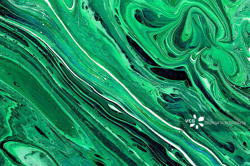 抽象色彩的背景纹理流体艺术丙烯酸颜料。绿色的颜色图片素材