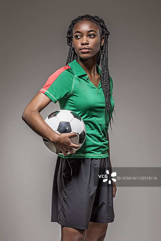 女足球运动员与足球图片素材