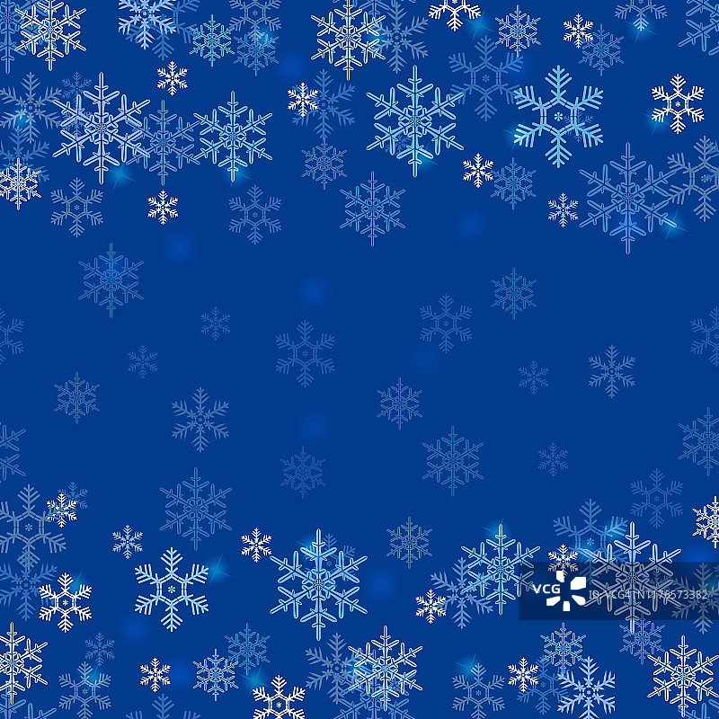 冬季边界与白色和蓝色的雪花在蓝色模糊的软背景。圣诞和新年假期的壁纸图片素材