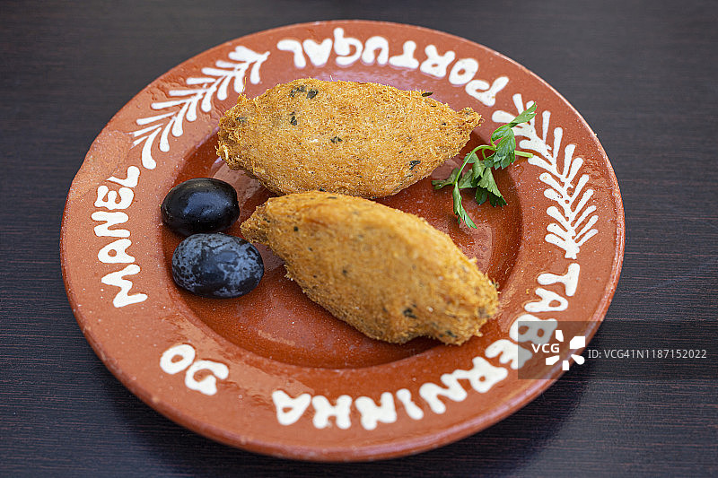 传统葡萄牙美食，鱼鳕鱼蛋糕图片素材