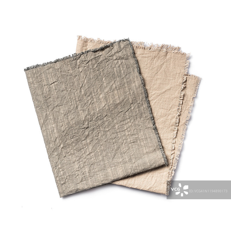 俯视图折叠的复古亚麻布餐巾图片素材