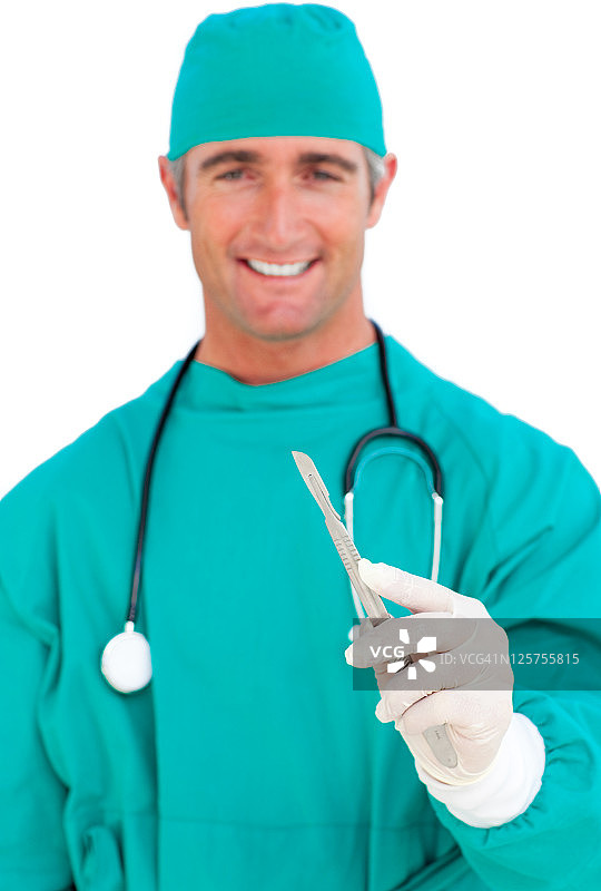漂亮的外科医生拿着手术刀图片素材