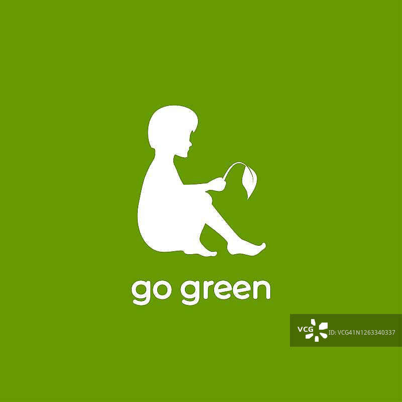 孩子与芽。男孩和叶子。白色标识绿色隔离。生态标志。生态友好。图片素材