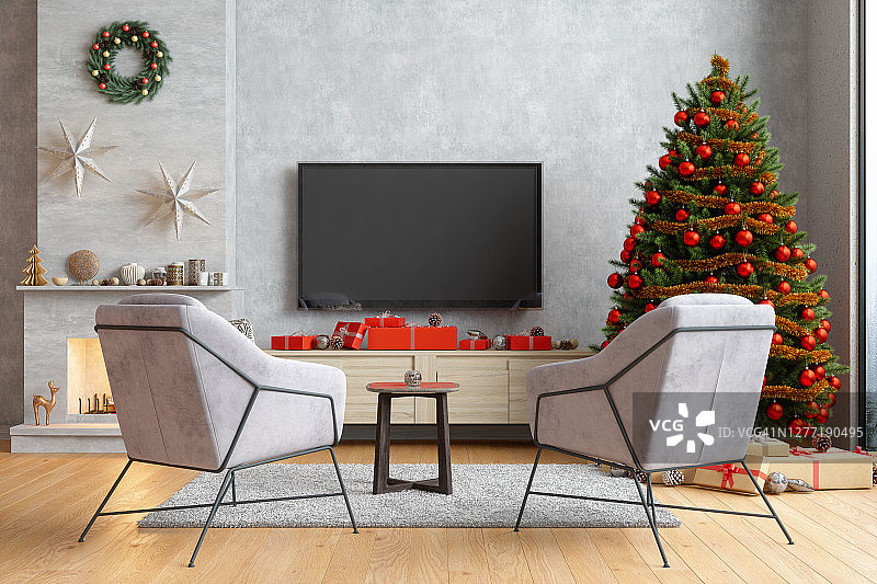 智能电视模型与空白屏幕在现代客厅扶手椅，圣诞树和礼品盒图片素材
