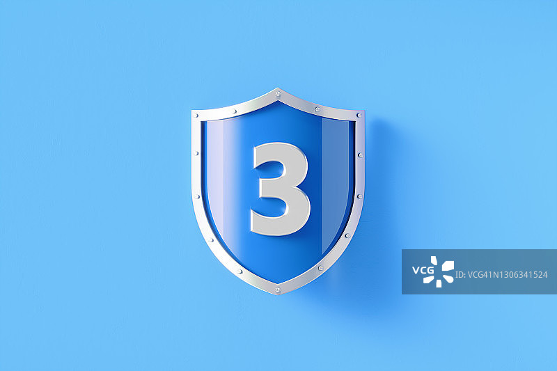 安全和安全概念-银盾3坐在蓝色背景图片素材