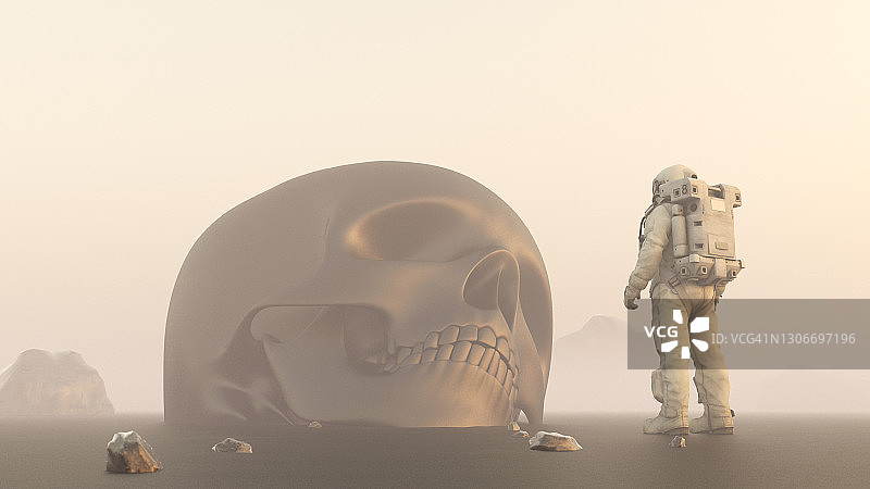 宇航员在另一个星球上发现了一个巨大的头骨图片素材