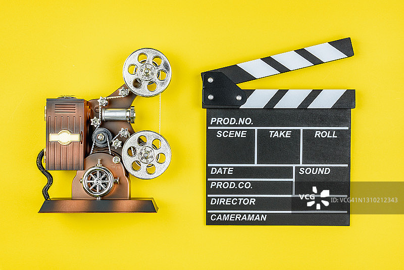 电影放映机、电影摄制设备、拍片板，用于电影和录像制作中，协助画面和声音同步，用以指明和标记各种场景和镜头的设备图片素材