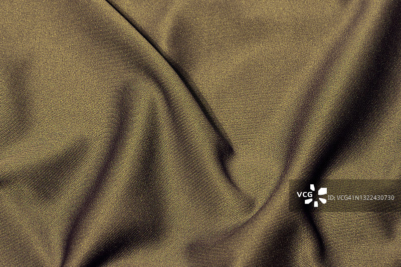 棕色织物布聚酯纹理和纺织背景。图片素材