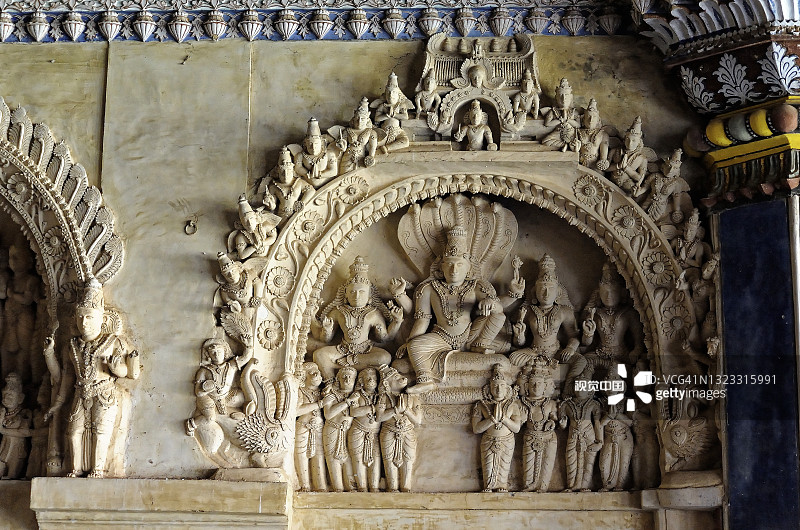 在马拉地达巴尔大厅墙壁上的灰泥工作中的印度教神希什萨哈希毗瑟奴图片素材