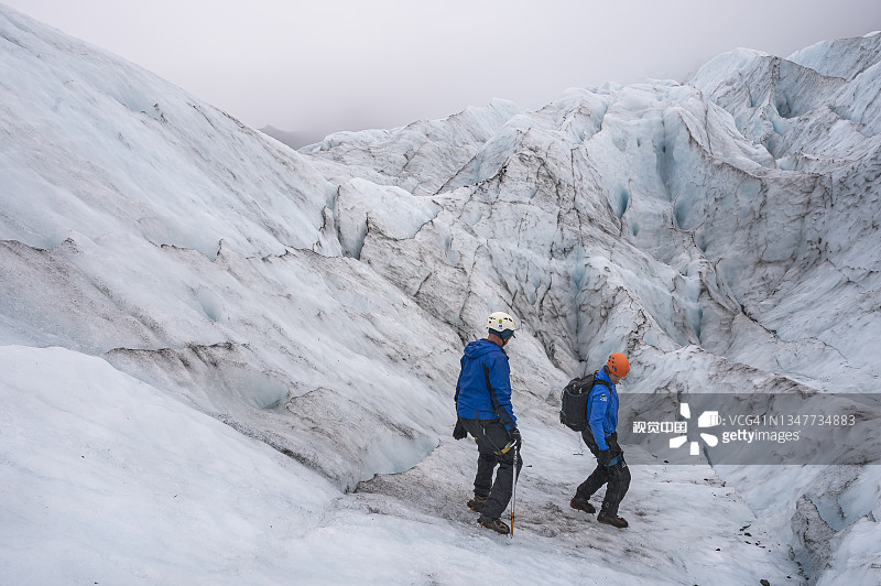 在Vatnajökull冰川的Svínafellsjökull出口徒步旅行图片素材