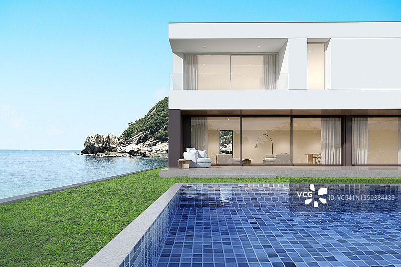 3d渲染的现代豪华住宅与游泳池的海洋背景。图片素材