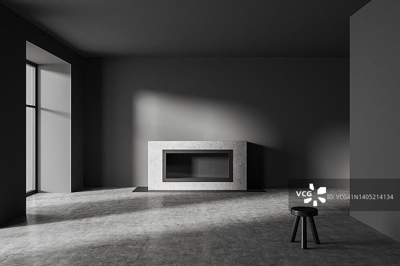 灰色的空空如也的一室公寓，壁炉，窗户和凳子放在黑暗的地板上图片素材