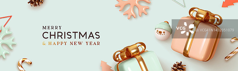 圣诞节网页横幅。圣诞设计用逼真的装饰礼盒蓝色和粉红色的颜色，3d雪花，糖果拐杖，树锥。横向节日新年海报，贺卡，网站标题图片素材