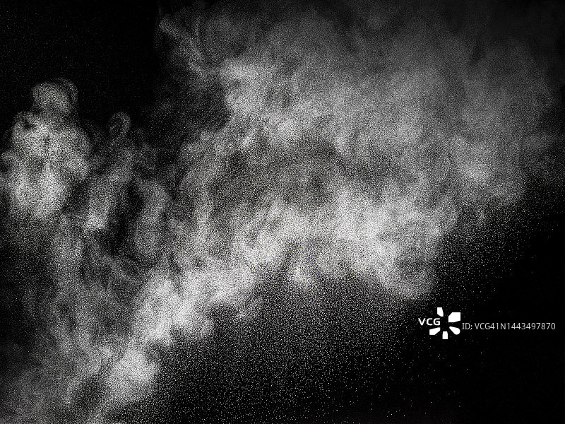 灰尘和烟雾在黑色背景上爆炸产生的冲击波。图片素材