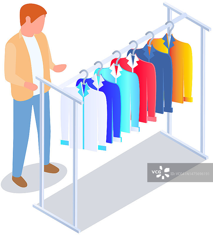 在店里挑选衣服，购物理念。男买家在试衣间挑选衣服图片素材