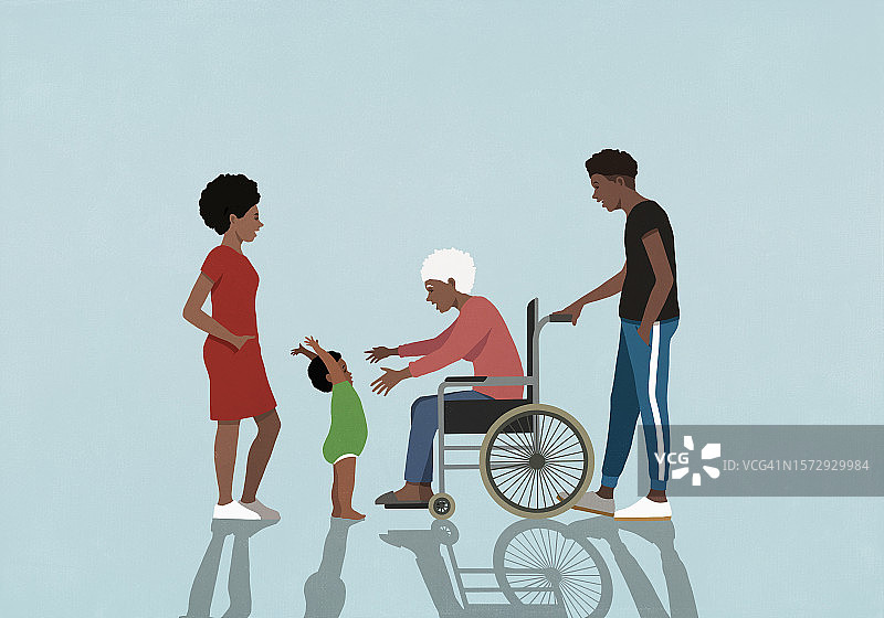 一家人看着坐在轮椅上的奶奶伸手去抱小孙子图片素材