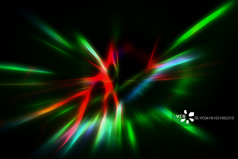 漩涡与闪烁和闪烁的绿色和红色的光在黑色的背景。图片素材
