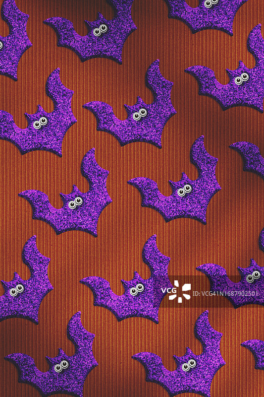 万圣节背景紫色闪光蝙蝠无缝图片素材