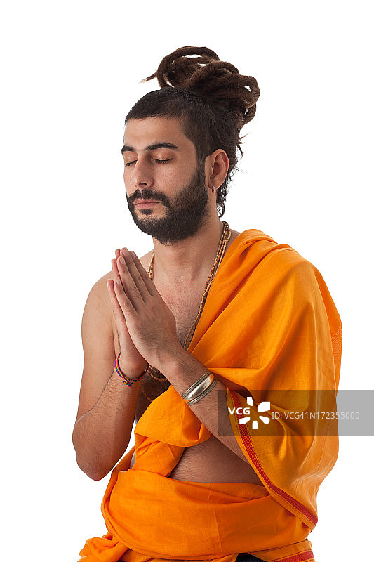 印度教大师在白色背景上冥想图片素材