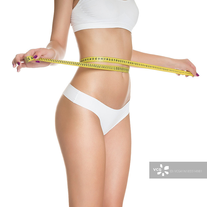 女人测量完美的形状美丽的匀称的腰健康图片素材