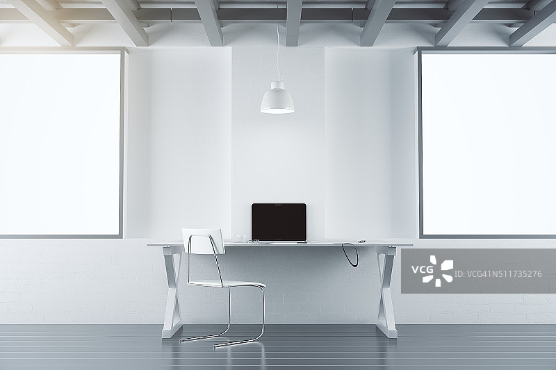 现代化的办公室，家具，笔记本电脑和空白的白色海报图片素材