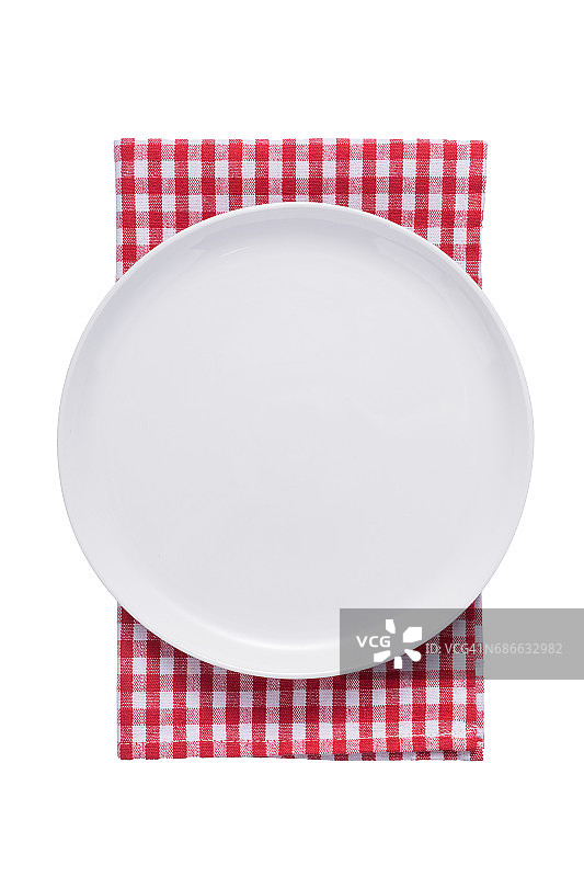 红格子桌布上的白色盘子图片素材